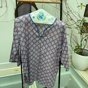 Elegant Women's Top with Purple and White Design